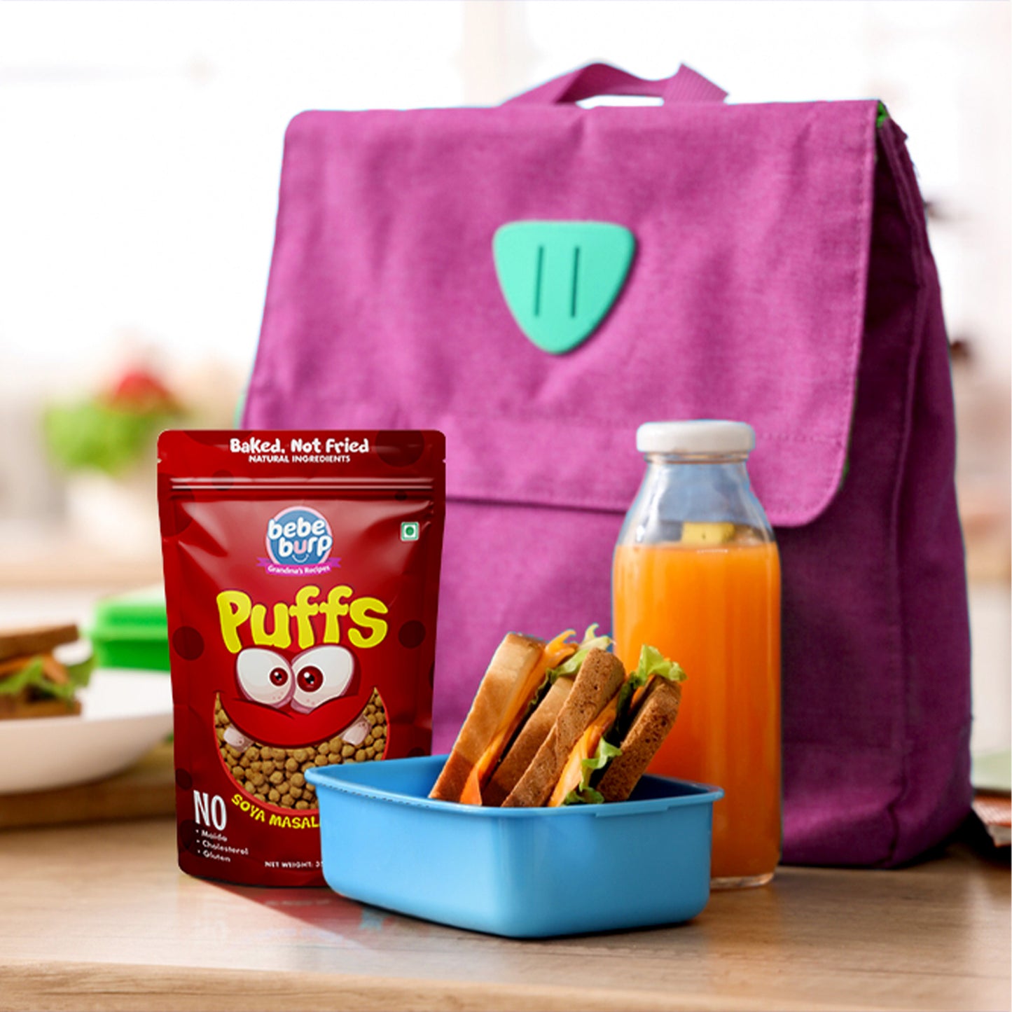 Four packs of Bebe Burp Masala Puff in soya masala masti flavor, shown with soy chunks, onion, pink salt, and lentils.