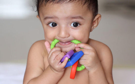 What are the symptoms of Teething? - BebeBurp